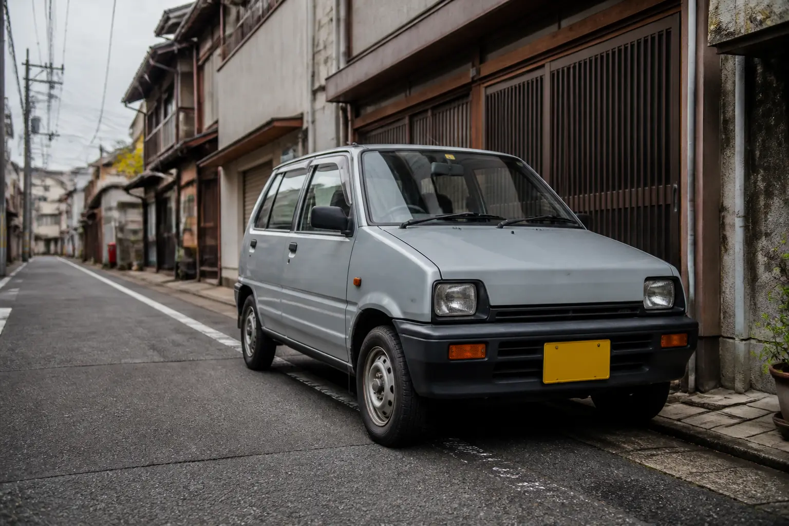 Компактний кей-кар Isuzu 1990-х років на японській вулиці