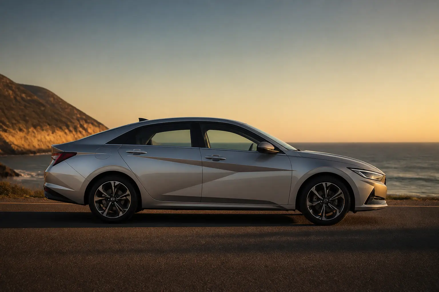 Сучасний седан Hyundai з динамічним дизайном на тлі узбережжя