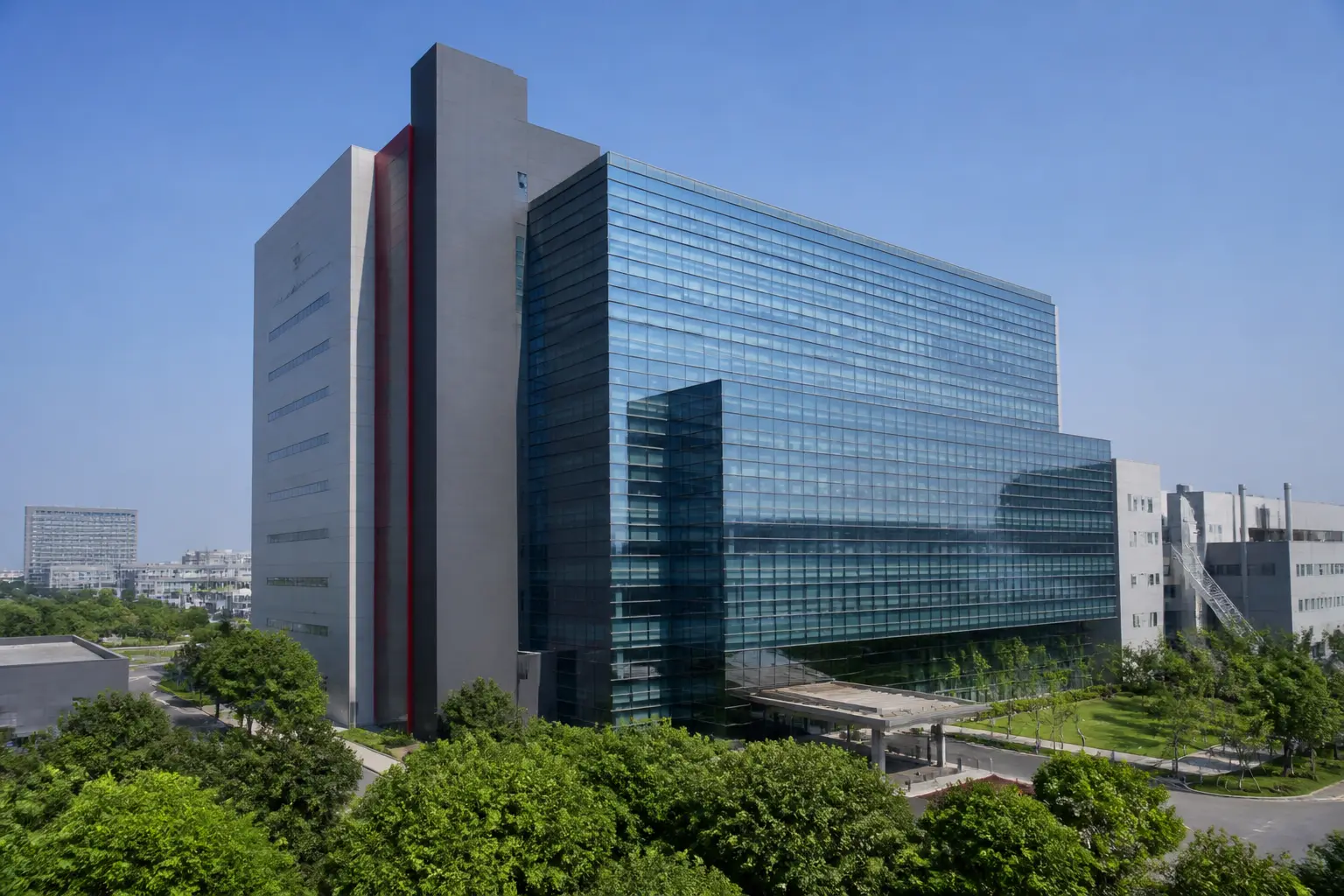 Сучасна будівля штаб-квартири TSMC у науковому парку Сіньчжу, Тайвань
